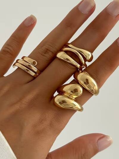 A Set Of 4 Elegant And Minimalist Golden Rings, Adjustable Open Rings For Women, Featuring A MultiLayer Spiral And Teardrop Geometric Design, Suitable For All Seasons