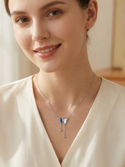 925 Sterling Silver Elegant Silver Butterfly Necklace with Blue Enamel and Mother-of-Pearl Accents